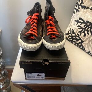 Converse High-Tops with Vibrant Orange Laces